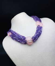 Stunning necklace made of 100% natural Amethyst smooth square shape & Natural Rose quartz smooth tumble beaded necklace with 925 sterling silver handmade clasp. DETAILS : Gemstone: Amethyst & Rose quartz Strand: 5 Calibration: Amethyst beads - 4x6 millimeters approx / Rose quartz tumble - 15x20 millimeters till 18x25 millimeters approx Weight: 700.35 carat Length : 34.00 Inches long SKU - HJFN0001 GENUINE BLACK STONE FACETED RONDELLE SHAPE BEADS LEMON QUARTZ FACETED ROUND BALL SHAPE BEAD Handmade Purple Rectangular Necklace, Elegant Purple Rectangular Necklace, Rectangular Purple Amethyst Necklaces, Purple Rectangular Amethyst Necklaces, Purple Rectangular Amethyst Necklace, Elegant Purple Necklace, Designer Necklace, Wear Necklaces, Amethyst Beads