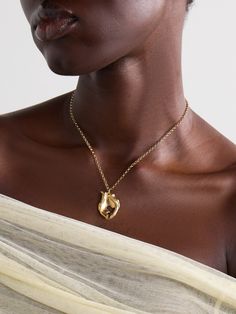 The story behind Alighieri's 'The Spellbinding Amphora' necklace is truly serendipitous - designer Rosh Mahtani was practicing the lost-wax techniques used to make the label's jewelry when she noticed the cast broke apart in such a beautiful way. Gold-plated bronze was then poured into the mold to create the textured, sculptural pendant that forms its enchanting silhouette. Alighieri Necklace, Amphora Necklace, Rosh Mahtani, Raffia Bag, Jo Malone London, Fine Watches, Lost Wax, Beauty Sets, The Cast