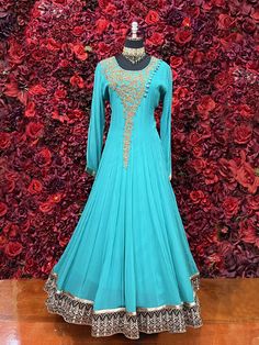 Go all out in this beautiful Anarkali, which is sure to bring out the innate grace and grandeur in you! Color -Dark Turquoise Blue Fabric & Work Style - - Soft Lycra stretchable fabric. Details - - Assured quality - Wash care instruction: Dry clean only. - Slight variation in color is possible due to digital photography. Floor-length Blue Kurta With Zari Work, Blue Floor-length Kurta With Zari Work, Blue Maxi Length Sharara With Cutdana, Blue Anarkali Churidar With Cutdana, Anarkali Blue Churidar With Cutdana, Elegant Blue Churidar With Cutdana, Blue Dabka Anarkali Set For Diwali, Blue Zari Work Anarkali Set Maxi Length, Blue Bollywood Style Floor-length Kurta