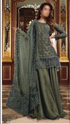 *Brand Name*     *MARIA B * *ORGANZA/NET*       *FABRIC DETAILS *  (SHIRT) ...ORGANZA (DUPATTA)ORGANZA (TROUSER) MALAI & NET *EMBROIDERY DETAILS* *FRONT*  EMBROIDERED *with stones handwork & cutwork* *NECK*  EMBROIDERED *with stones handwork* *FRONT*  BORDER EMBROIDERED *with stones handwork* *BACK* EMBROIDERED BACK BORDER EMBROIDERED *SLEEVES* EMBROIDERED SLEEVES BORDER EMBROIDERED *DUPATTA * EMBROIDERED *with 4 side embroidered border* *GHAGRA*  EMBROIDERED  *BEST QUALITY IS OUR TOP PRIORITY* The model picture is only for reference you will get the dress as shown in unstitch pic. This dress will be make to order according to your size (your given measurements) and will be ready to ship in 4 to 5 weeks. Festive A-line Wedding Dress, Festive A-line Evening Dress For Wedding, Glamorous Semi-stitched Wedding Dress, Festive A-line Wedding Gown, Green Festive Evening Dress, Embellished Dressy Wedding Dress, Dressy Embellished Wedding Dress, Green A-line Wedding Dress, Semi-stitched Long Dresses For Party