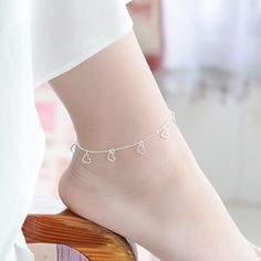 Style: Simple Heart-shaped Alloy Bracelets As Gift, Heart-shaped Alloy Bracelet For Gift, Silver Heart-shaped Alloy Bracelets, Valentine's Day Heart-shaped Alloy Bracelet, Elegant Adjustable Alloy Heart Bracelet, Trendy Adjustable Heart-shaped Anklets, Adjustable Alloy Anklets For Gift, Adjustable Alloy Anklet As Gift, Trendy Alloy Jewelry With Heart Charm