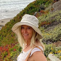 "A handmade sun hat for sunny beach days and summer fun.  This linen sun hat for women has a nice wide brim to protect your whole face and even your neck and chest. A drawstring around the head keeps the hat fitting snug.  Easy to bring along in your bag, folds up easy.   This hat is made from a medium weight homespun linen and cotton blend fabric in a neutral beige color.  Inside liner is white cotton.  I used a stiff interfacing for brim to keep it's shape. Brim measures 4.5\" Crown depth is 3 Bohemian Sun Hat For Vacation In Warm Weather, White Sun Hat For Warm Weather, Beige Beachy Sun Hat With Uv Protection, Beachy Beige Sun Hat With Uv Protection, Lightweight Beachy Sun Hat In Beige, Coastal Sun Hat For Vacation, Beachy Sun Hat, One Size Fits Most, Coastal Sun Hat For Beach Travel, Coastal Style Sun Hat For Beach Travel