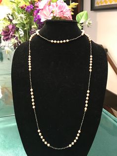 "This piece was designed to copy an actual necklace worn by Lady Mary in the PBS series Downton Abbey. This necklace is 50\" of glittering faceted gold natural iron pyrite beads interspersed with mint condition 6mm vintage cream faux Majorca pearls OR genuine AAA freshwater pearls (choose when you checkout). This is a VERY long necklace; it measures 50\" total from top to bottom. It can be worn as one long necklace (if you're tall or channeling your inner flapper) but it's also meant to be loope Downton Abbey Jewelry, Victorian White Gold Necklaces For Evening, Victorian Style White Gold Necklace For Evening, Victorian White Gold Necklace For Evening, Vintage Briolette Necklace For Formal Occasions, Classic Long Evening Necklace, Classic Long Necklace For Evening, Elegant Double Strand Beaded Chain Necklace, Elegant Handmade Formal Custom Necklace