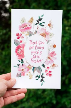 a hand holding up a card that says thank you for being such a great teacher