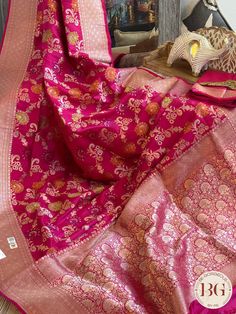 Indulge in luxury with our Banarasi Handloom Katan Silk Saree in stunning rani pink. This exquisite saree is made from the finest quality of silk, certified by Silk Mark for its authenticity and elegance. Elevate your style with this exclusive piece, perfect for any special occasion. Banarasi Handloom Katan Silk Saree - Silk mark certified - rani pink Saree comes with a blouse piece. Fall and pico done. Fully stitched blouse shown in pictures is optional and can be purchased seperately from our blouses and croptops section. For saree video please connect with us on whatsapp @469-937-0606 Ready to be shipped in USA from San Diego, California. All pictures are original pictures. Colors may slightly vary due to pic resolution. Luxury Pink Katan Silk Blouse Piece, Eid Pink Traditional Wear With Cutdana, Elegant Pink Dupatta For Diwali, Elegant Pink Cutdana Dupatta, Elegant Pink Art Silk Traditional Wear, Pink Paithani Silk Traditional Wear With Patterns, Pink Paithani Silk Traditional Wear With Traditional Patterns, Pink Traditional Wear With Paithani Silk And Traditional Patterns, Pink Paithani Silk Traditional Wear For Navratri