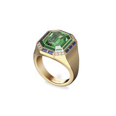 This opulent cocktail ring collection is a true statement of luxury and timeless elegance. Each piece showcases the exquisite craftsmanship of fine enamel work, featuring large, vibrant-colored gemstones paired with lab-grown diamonds. The classic trio of rich red, green, and blue hues come together in perfect harmony, evoking a sense of vintage sophistication. The textured gold band adds a layer of depth, enhancing the overall grandeur and ensuring these rings stand out as masterpieces of retro Rings Stand, Colored Gemstones, Diamond Cocktail Ring, Diamond Cocktail Rings, Ring Collection, Ring Stand, Perfect Harmony, Gold Texture, Ring Collections