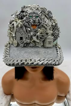 **Introducing the "Fierce Fantasy Junkie Trucker Hat"** Elevate your style with the **Fierce Fantasy Junkie Trucker Hat**--a dazzling masterpiece for those who embrace boldness and flair. This exceptional piece transforms the classic trucker hat into a glamorous expression of individuality. Each **Fierce Fantasy Junkie Trucker Hat** is a unique creation, lavishly adorned with sparkling embellishments and striking design details. These intricate touches add an extravagant flair, ensuring that your hat reflects your personal aesthetic. With customizable charm options, you can design a piece that perfectly aligns with your style, whether you seek an eye-catching statement or a more harmonious blend.  What sets this hat apart is its commitment to exclusivity--no two hats are ever alike. Each p Bedazzled Hat, Custom Hat Ideas, Rhinestone Hat, Crazy Hat, Statement Hat, Diy Wings, Surprise Az, Painted Hats, Different Hats