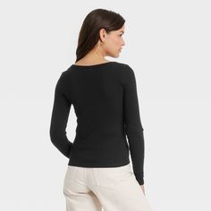 This Rib Long-Sleeve Scoop Neck T-Shirt from Universal Thread™ offers easy pairing with a range of looks. Fashioned in a fitted silhouette with a long length, this long-sleeve tee features a casual scoop neck and a ribbed construction for textured flair. The cotton material with added spandex offers a comfortable, stretchy fit. This shirt is ideal for layering or wearing on its own, plus, you can pair it with your choice of pants or shorts. Fitted Casual Long Sleeve Top With Scoop Neck, Fitted Casual Long Sleeve Scoop Neck Top, Casual Scoop Neck Tops For Fall, Fitted V-neck T-shirt For Fall, Basic Scoop Neck T-shirt For Fall, Fitted Scoop Neck T-shirt For Fall, Relaxed Fit Scoop Neck T-shirt For Fall, Fall Basic Scoop Neck T-shirt, Trendy Scoop Neck T-shirt For Fall