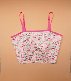 "-Made to Order- Many girls love crop top. Here it is in cute flamingo print! from Amordress:) Top Design: -Adjustable spaghetti straps style -Ribbon straps. -Back self-tied bow ✄ SIZE ✄ Top Size: S Bust 31\"-34\" M Bust 36\"-38\" L Bust 39\"-40\" XL Bust 41-43\" Top length is around 15\"-16\" depends on how much straps is adjusted. ✄ MATERIAL ✄ ●Cotton Fabric ●Polyester lining material. ♥ Matching pearl necklace/ affordable jewelry CLICK=> https://www.etsy.com/shop/Amordress?section_id=14993 Camisole Crop Top With Built-in Bra For Vacation, Vacation Crop Top With Built-in Bra And Spaghetti Straps, Printed Cotton Crop Top For Summer, Cute Pink Tops With Adjustable Straps, Summer Cotton Tops With Flamingo Print, Cotton Top With Flamingo Print For Summer, Summer Cotton Top With Flamingo Print, Camisole Crop Top With Straps For Vacation, Vacation Camisole Crop Top With Straps