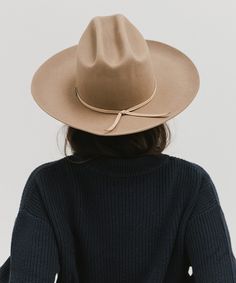 Ezra blends statement fashion with Western. A classic cattleman crown made to be styled for the city as much as the countryside. This hat features an upturned brim + a tall crown, giving Ezra a modern + feminine feel. Ezra comes with a removable tonal grosgrain band featuring a brass Gigi Pip pin. Other bands pictured are sold separately. Tall Crown, Gigi Pip, Measuring Stick, Western Vibes, Western Hat, Statement Fashion, Crown Heights, Band Pictures, Modern Feminine