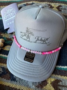 GLOWS IN THE DARK! Add a touch of sweetness to your trucker hat with our Howdy Honey chain. It's the perfect accessory to complete your look and show off your playful side. chains are made with two clasps ends size fits standard trucker hat sizing HAT NOT INCLUDED Straw Cowgirl Hat, Country Hat, Statement Belts, Hat Chain, Prada Tshirt, Fade Designs, Patriotic Tees, Mesh Tops, Fun Socks