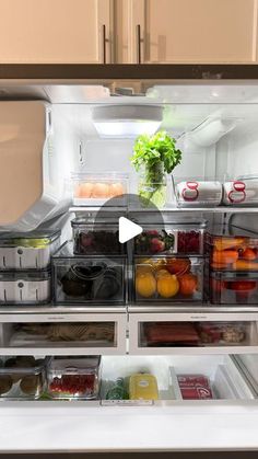 an open refrigerator filled with lots of different types of vegetables and fruit in it's doors