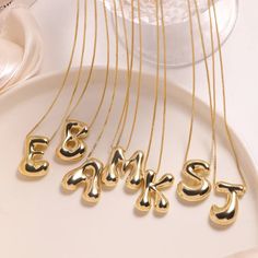 Make a statement with our Balloon Letter Chunky Necklace! This trendy gold-plated necklace features smooth stainless steel balloon-style letters, each representing a different initial for a personalized touch. The geometric design and chunky pendant make it a standout piece perfect for adding personality to any outfit. Designed for women who love hip-hop and rock styles, this necklace includes a durable Figaro chain and suits various occasions, from parties to anniversaries. The Balloon Letter C Bubble Letter, Letter Jewelry, Letter Pendant Necklace, Initial Necklace Gold, Monogram Necklace, Waterproof Jewelry, Gold Initial, Unisex Jewelry, Letter Pendants