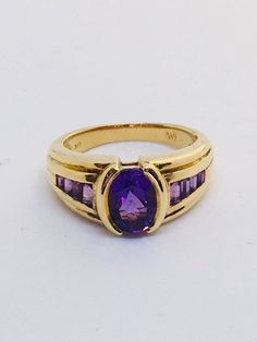 Purple Ruby Ring For Formal Occasions, Classic Amethyst Ring Stamped 14k, Formal Gold Amethyst Ring With Bezel Setting, Heirloom Yellow Gold Amethyst Ring With Accent Stones, Formal 14k Stamped Amethyst Ring, Classic Purple Gemstone Signet Ring, Classic Amethyst Signet Ring Hallmarked, Hallmarked 14k Gold Purple Amethyst Ring, 14k Gold Hallmarked Purple Amethyst Ring