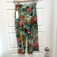 An Exuberant Tropical Print Lends Color And Style To Breezy Crinkle-Woven Pants Done In A Flowy, Wide-Legged Cropped Cut. Lay Flat Waist Measurement Is About 12” Rise Is 11.5” And Inseam Is 20” Back Zip And Clasp Closure Made In India Summer Printed Loungewear Pants, Summer Printed Pants For Loungewear, Summer Floral Print Beach Pants, Floral Print Summer Pants For Beach Season, Floral Print Summer Pants For Vacation, Summer Floral Print Pants For Vacation, Summer Floral Print Pants For Beach Season, Summer Vacation Floral Print Pants, Printed Wide-leg Pants For Vacation