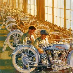 two men working on motorcycles in a factory