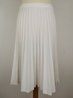 Pleated Midi Maxi Skirt For Party, White Pleated Skirt For Spring Party, Spring Formal A-line Pleated Skirt, Elegant A-line Maxi Skirt With Pleated Hem, Summer Wedding A-line Skirt, Summer Evening Accordion Pleated Skirt, Spring A-line Maxi Skirt With Pleated Hem, Solid Color Flowy Midi Pleated Skirt, Elegant Summer Maxi Skirt With Pleated Waist