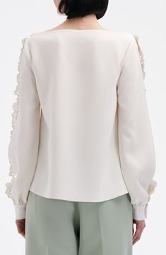 Intricate broderie anglaise details the bateau neck and open sleeves of this popover top crafted from stretch silk. Bateau neck Long sleeves with button cuffs Silk/elastane Dry clean Imported Designer Clothing Elegant Embroidered Sleeve Top For Work, Elegant Tops With Embroidered Sleeves For Work, Elegant White Long Sleeve Top For Spring, Elegant White Tops With Lace Sleeves, Elegant Beige Tops With Blouson Sleeves, Chic Tops With Lace Sleeves For Formal Occasions, Chic Formal Tops With Lace Sleeves, Elegant Long Sleeve Embroidered Lace Top, Elegant Cream Tops With Blouson Sleeves