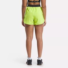 From the gym to the studio, to exploring the outdoors, these women's Reebok Lux Woven Shorts are made for movement. This retro sporty silhouette features a dolphin shaped hem and high-rise knit waistband for ultimate comfort and style. Outdoor Sportswear With Built-in Shorts, Green Athleisure Bottoms For Outdoor, Athleisure Workout Shorts With Elastic Side Panels, Athleisure Shorts With Elastic Side Panels For Workout, Workout Activewear With Elastic Side Panels, Athleisure Sports Shorts With Elastic Side Panels, Sportswear Athletic Shorts With Elastic Waistband For Outdoor, Sportswear Athletic Shorts With Elastic Waistband, Athleisure Athletic Shorts With Elastic Waistband