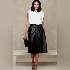 This Lightweight Vegan Leather Midi Skirt Is The Perfect Piece For Any Occasion. *Soft And Smooth *Button Front Closure *Belt Loops *Front Pockets *Waist Darts *Full Hem *Fully Lined This Faux Leather Looks And Feels Luxurious. Leather Midi Skirt Outfit, Panel Event, Beige Pencil Skirt, Fall Winter Fashion Trends, Business Looks, Evening Fashion, Natural Fashion, Casual Glam, Over 50 Fashion