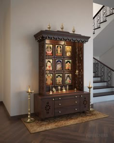 a wooden cabinet sitting on top of a hard wood floor next to a stair case