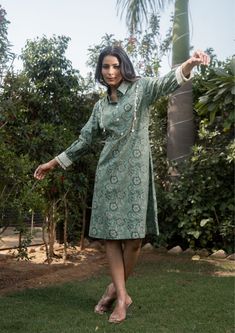 Green Midi Dress Floral Printed and Embroidery Work Design Long Sleeve Midi Cotton Button Down Dress with Collar Women Summer Short Dress Fabric - Cotton  Sleeve - Full Sleeves Work - Printed and Embroidery Color - Green Size - (XS), (S), (M), (L), (XL), (2XL) Length of the Dress- 45" (114 cm) This is a lovely green midi dress for women, perfect for summer. It has a floral print and embroidery work design, adding a touch of elegance. The dress features long sleeves and a button-down front with a Green Knee-length Casual Shirt Dress, Casual Green Knee-length Shirt Dress, Knee-length Cotton Midi Dress With Buttons, Green Fitted Midi Shirt Dress, Green Cotton Shirt Dress For Summer, Knee-length Button Dress For Garden Party, Summer Green Cotton Shirt Dress, Green Knee-length Buttoned Shirt Dress, Traditional Green Straight Kurta Dress