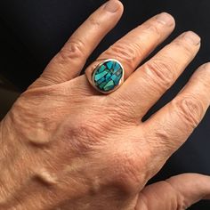 Please note that each ring is unique, one of a kind. The ring pictured is a sold example. Any ring purchased from this listing will have a similar look and feel and is returnable. Each ring is inlaid by hand using finest gem quality natural, undyed, untreated, blue to blue-green turquoise. This is very rare Nevada turquoise that is no longer mined or available that has been in my personal collection for almost 40 years. Each select piece of turquoise is carefully set in a hard and durable resin Blue Oval Rings With Inlay, Unique Turquoise Multi-stone Opal Ring, Unique Turquoise Opal Ring With Multi-stone Design, Turquoise Oval Multi-stone Opal Ring, Elegant Turquoise Inlay Rings, Blue Turquoise Ring With Inlay, Turquoise Rings With Polished Finish For Anniversary, Artisan Multi-stone Turquoise Ring, Artisan Rings With Inlay For Anniversary