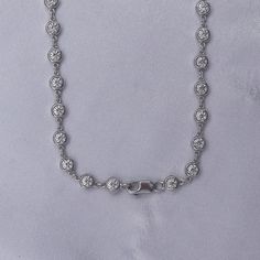 This exquisite 3 3/4 Carat round moissanite diamond necklace features a delicate link chain and a bezel-set design. Expertly crafted with lab-created diamonds in 10K or 14K solid gold and 925 sterling silver, this piece radiates luxury and sophistication. The perfect addition to elevate any outfit. Model No : CSSN1523 Link Chain Necklace, Round Moissanite, Moissanite Diamonds, Chain Link Necklace, Lab Created Diamonds, Diamond Clarity, Bezel Setting, Necklace For Women, Set Design