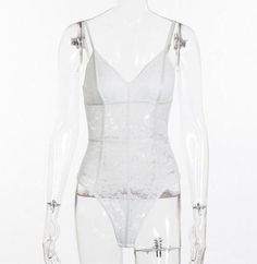 Gender:Women Fabric Type:Mesh Fit Type:skinny Decoration:Lace Pattern Type:Floral Color :Black,White Material:90%Polyester,10%Spandex Fitted White Bodysuit With Built-in Bra, Fitted Club Bodysuit With Lined Body, Fitted Bodysuit With Lined Body For Club, White Corset For Club, White Fitted Corset For Club, White Fitted Corset For Club Wear, White Fitted Bodysuit With Built-in Bra, Backless Lace Bodysuit For Summer, Summer Stretch Bodysuit With Lace Closure