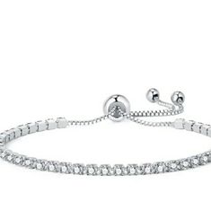 Coming Soon To My Closet. Please Like To Get Discount Notifications. Elegant, Subtle And Regal, This Cz Tennis Bracelet Is A Great Piece To Add To Your Collection. Perfect For Pulling Together A Semi-Casual Outfit Or When You Want To Pair It With Other Pieces For A Night Out. It Will Illuminate Your Look Whenever You Need To, Adding Twinkle And Elegance To Any Outfit. This Radiant And Glimmering Bracelet Makes For A Great Gift. Elegant White Gold Bracelet With Sparkling Stones, Elegant Sterling Silver Bracelet With Sparkling Stones, Elegant Adjustable Diamond Bracelet With Brilliant Cut, Elegant Sterling Silver Bracelet With Sparkling Cubic Zirconia, Elegant Diamond White Bracelets With Sparkling Stones, Elegant Adjustable Brilliant Cut Diamond Bracelet, Elegant Adjustable Diamond Bracelet, Cubic Zirconia Bracelet With Adjustable Chain For Anniversary, Cubic Zirconia Diamond Bracelet With Adjustable Chain For Anniversary