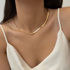 "Discover the exquisite beauty of our 18K Gold Vermeil Herringbone Snake Chain Necklace, a must-have accessory for those who appreciate sophisticated style. This eye-catching piece boasts a unique combination of the classic herringbone pattern and a modern snake chain design, making it the perfect addition to your jewelry collection. * Materials: High-Quality Solid 925 Sterling Silver * Finish: 18K Gold Vermeil and Silver * Necklace Length: 17\" (If you want extender, just let us know, we ll try Necklace Snake Chain, Herringbone Chain Necklace, Necklace Snake, Gold Snake Chain, Herringbone Chain, Herringbone Necklace, Snake Chain Necklace, Snake Necklace, Dainty Chain