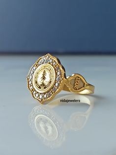 This product is GUARANTEED for life. * College graduation rings for men and women delicately engraved with your school logo or any other initials or image you want. * The ring has solid back. Deep and detailed engraving very delicately handcrafted unisex - looks super cool on both women & men * The ring is 14K Gold * Please contact me for your 14 carat and 18 carat solid gold requests. I can gladly do. * Certified 14k solid gold, hallmarked 14k for solid gold rings. * The ring has solid back 22k Gold Rings For Anniversary, 22k Gold Rings For Gift, Fine Jewelry 22k Gold Rings For Gift, 22k Gold Fine Jewelry Rings For Gift, Oval Gold Hallmarked Wedding Ring, Heirloom Style Hallmarked Diamond Ring As Gift, Traditional Gold Rings With Center Stone, 22k Gold Diamond Ring For Anniversary, Gold Ring With Center Stone - Gift