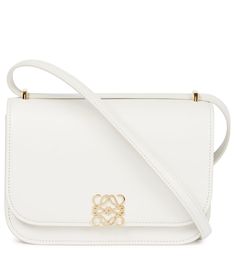 LOEWE's Goya Small bag is the ultimate expression of fine Spanish craftsmanship. A clean design with a golden Anagram closure, it's made in the house's Madrid atelier from soft white silk calfskin leather and lined in contrasting nappa. It comes with a sliding shoulder strap that allows it to be worn across the body or doubled up as a shoulder bag. 2023 Wishlist, Clothes Model, White Silk, Bags Designer Fashion, Together We Can, Clean Design, Soft White, Small Bag, Vintage Accessories