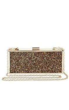 Dazzling rock crystals adorn this elegant clutch for a shimmering finish to enviably sweet evening looks.Rectangular clutch.Exterior rock-crystal detailing.Interior pocket.Top clasp closure.Material: Glass.7.5" W. 3.25" H. 1.5" D. Chic Sparkling Clutch For Party, Elegant Glitter Evening Bag Rectangular, Glamorous Glitter Rectangular Evening Bag, Elegant Rectangular Glitter Evening Bag, Sparkling Rectangular Clutch For Party, Rectangular Glitter Evening Bag For Formal Events, Chic Rectangular Clutch For Events, Glamorous Evening Clutch With Glitter, Glitter Rectangular Clutch For Formal Occasions