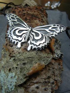 Sterling Metalwork Butterfly Necklace Leather cord or by TandBrie Bohemian Butterfly Sterling Silver Necklace, Nature-inspired Butterfly Charm Necklaces, Handmade Unique Butterfly Necklace, Bohemian Sterling Silver Butterfly Necklace, Handmade Unique Butterfly Shaped Necklace, Unique Handmade Silver Butterfly Necklace, Handmade Silver Butterfly Necklace, Bohemian Butterfly Necklace For Gifts, Bohemian Butterfly Necklace As A Gift