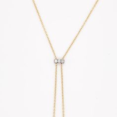 This striking makes quite an iconic statement with diamonds in the center and on the ends of the bars. It hangs beautifully on anyone’s neck and is great with a v shape or rounded neckline. We had one client buy this necklace for their wedding dress. Casual or dressy this necklace is a show stopper! The chain is solid 14 karat yellow gold and the diamonds are all set in 14 karat white gold to show off the diamonds. The details for this beautiful necklace are listed below:Metal Quality: 14K Yello Elegant Formal Diamond Necklace With Adjustable Chain, Timeless Formal Chain Necklace With Diamond Accents, Elegant Bridal Necklace With Adjustable Chain For Formal Occasion, Luxury Wedding Drop Necklace With Diamond Accents, Elegant Formal Lariat Necklace With Adjustable Chain, Elegant Bridal Necklace With Adjustable Chain And Cubic Zirconia, Elegant Diamond Chain Necklace With Adjustable Chain, Elegant Single Cut Diamond Chain Necklace For Formal Occasions, Elegant Formal Chain Necklace With Single Cut Diamonds