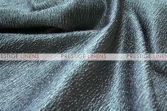 a close up view of the textured fabric in blue and grey tones, as well as