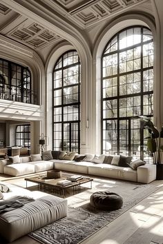 a large living room with lots of windows