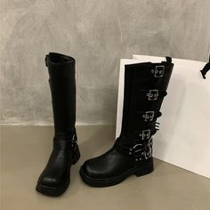 SPECIFICATIONSBrand Name: AmozaeBoot Type: WESTERNShaft Material: PUOutsole Material: RUBBERUpper Material: PUHign-concerned Chemical: NoneOrigin: Mainland ChinaCN: ZhejiangSeason: WinterInsole Material: PUHeel Type: Square heelLining Material: microfiberBoot Height: Knee-HighItem Type: BOOTSFashion Element: Belt BuckleDepartment Name: ADULTToe Shape: round toeHeel Height: High (5cm-8cm)With Platforms: YesPlatform Height: 0-3cmStyle: Romanis_handmade: YesPattern Type: SolidFit: Fits true to size Trendy Wide Calf Martin Boots For Spring, Trendy Winter Martin Boots With Square Toe, Trendy Knee-high Martin Boots For Spring, Trendy Spring Knee-high Martin Boots, Trendy Summer Knee-high Boots With Round Toe, Black Martin Boots With Square Toe For Spring, Trendy Closed Toe Knee-high Boots For Spring, Trendy Spring Knee-high Closed Toe Boots, Black Square Toe Martin Boots For Spring