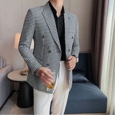 Step up your fashion game with this men's slim fit double-breasted houndstooth blazer. Crafted with precision and designed for modern style, this blazer features a classic houndstooth pattern that never goes out of fashion. The slim fit design ensures a tailored look, perfect for both professional settings and sophisticated casual events. With a double-breasted front and notch lapels, it exudes confidence and elegance. The high-quality fabric ensures comfort and durability, making it an essentia Double-breasted Houndstooth Blazer, Business Casual Houndstooth Sport Coat, Classic Double-breasted Houndstooth Blazer, Formal Double-breasted Houndstooth Blazer, Double-breasted Houndstooth Outerwear For Business, Business Casual Long Sleeve Houndstooth Blazer, Semi-formal Blazer With Houndstooth Pattern And Suit Collar, Semi-formal Houndstooth Blazer With Suit Collar, Double-breasted Houndstooth Blazer For Business Casual