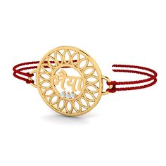 "A rakhi (bracelet made of thread, having a solid gold pendant in the center to which the thread is tied) that is made of 18K gold with diamonds. A Bhai , Motif styled real gold rakhi for your \"bhaiya\" to make this Raksha Bandhan super special for him. It's not just about the gold rakhi, but the whole package that he receives. The rakhi comes inside a posh gift box that completely elevates the gifting experience for both of you . Satin threads are provided on either side and it comes in a beau 22k Gold Jewelry For Navratri Gift, Spiritual Yellow Gold Bracelet, Round Bracelets Gift For Diwali, Diwali Gift Bracelets, Bangle Bracelets As Diwali Gifts, Yellow Gold Bracelet For Puja, Yellow Gold Bracelets For Puja Festivals, Yellow Gold Round Bracelet For Puja, Bracelet Jewelry As Navratri Gift