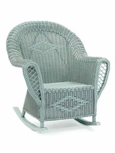 a wicker rocking chair is shown against a white background