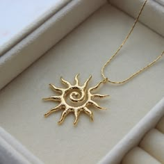 Sun Burst Necklace Length: 40cm Waterproof Stainless Steel Necklace 18K Gold Plating 5cm extender included Made with Stainless Steel and 18K Gold plating Packaging: All products come with freebies and are packed by hand, so they make a great gifting experience! Postage: All orders are dispatched in 1-2 working days. Materials and Care: This item is Stainless Steel and 18K gold plated. Regularly polish and buff the metal using a soft (lint-free) cloth. -------------------------------------------- Hand Jewelry Rings, Necklace Sun, Sun Burst, Sun Necklace, Sun Pendant, Euro Summer, Dope Jewelry, Jewelry Lookbook, Sun Rays