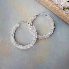 Snow earrings crystal hoop earrings big shiny white woman | Etsy Dazzling White Sparkling Hoop Earrings, White Bling Crystal Earrings For Party, Glamorous Party Jewelry With Glitter, Glamorous Glitter Jewelry For Party, Glamorous Crystal Rhinestone Hoop Earrings, Glamorous Rhinestone Crystal Hoop Earrings, Crystal Hoop Earrings With Rhinestones As Gift, Sparkling Hoop Crystal Earrings For Gift, Sparkling Hoop Crystal Earrings