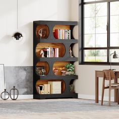 a living room with a book shelf filled with books