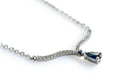 "Magnificent and regal white gold, diamond & sapphire necklace . The shining necklace dips down into an elegant 'v', created a winged shape, in a center a beautiful sapphire creating a true glittering masterpiece. Making this the perfect meaningful gift for yourself or loved one. ✦ Details -Gold weight - 3.13 grams -Diamond weight: 0.18 carat -Diamond color: G-H -Diamond Clarity: VS -Receive diamond certification with your order! -Choose between 14k or 18k solid gold -Choose yellow, white, o Elegant Sapphire Pear-shaped Necklace, Elegant Pear-shaped Sapphire Necklace, Elegant Sapphire Teardrop Pendant Necklace, Elegant Teardrop Sapphire Necklaces, Elegant Sapphire Briolette Necklace, Elegant Sapphire Teardrop Necklace, Elegant Teardrop Sapphire Necklace, Elegant Silver Sapphire Necklace, Elegant Sapphire Drop Necklaces