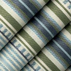 the fabric is green and blue with stripes