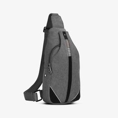 a gray backpack with black straps and zippers on the front, sitting against a white background