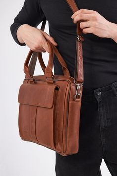 - Our product is 100% genuine leather. - It is produced in master hands with quality materials and delicate handwork. - Dimensions 29 x 39 cm Modern Camel Leather Shoulder Bag, Formal Camel Leather Shoulder Bag, Brown Briefcase With Leather Handles For Business Trips, Brown Leather Briefcase With Leather Handles For Business Trips, Brown Leather-handled Briefcase For Business Trips, Camel Leather Bags With Leather Lining, Luxury Leather Satchel In Camel, Luxury Leather Bag In Camel, Luxury Leather Camel Satchel