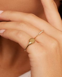 The 14k Gold Bespoke Signet Ring is a timeless style crafted in 14k solid gold. Sure to become a cherished ring they will keep for years-make it even more special by engraving heartfelt initials or a lucky number. Bespoke Signet Ring in 14k Solid Gold, Women's Size 3 by gorjana Signet Ring For Women, Women Gold Signet Ring, Gold Signet Rings, Silver Pinky Ring For Women, Classic Tarnish Resistant Diamond Ring, Classic 14k Gold Stackable Initial Ring, Gold Dainty Initial Ring With Polished Finish, Gold Stackable Signet Ring Fine Jewelry, Classic 14k Gold Ring With Bezel Setting